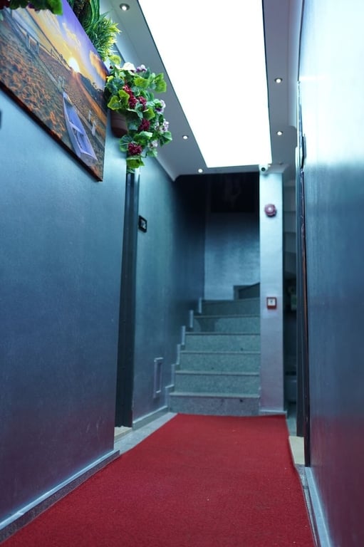 Middle Village(Also Known As Middle Village Suite Hotel)