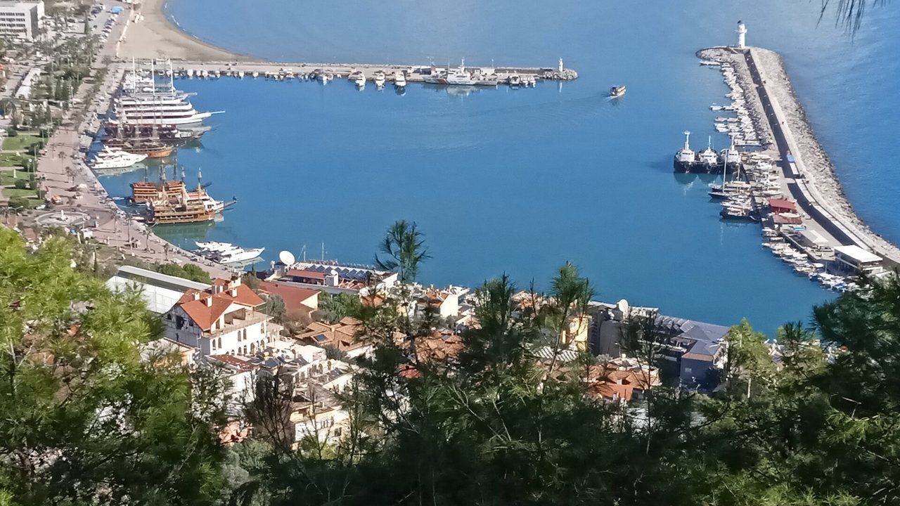 Panoramic view of Alanya Harbour and tour boats from the castle hill