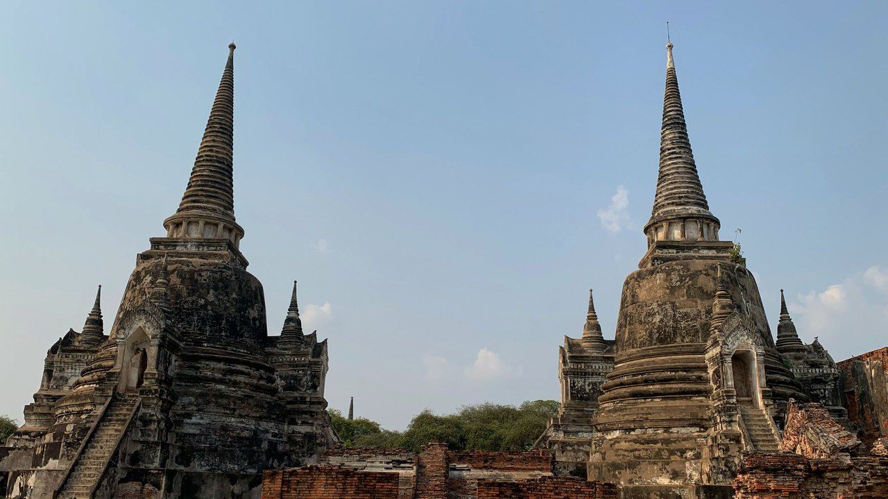 Historic temple ruins and ancient stupas in Ayutthaya Historical Park, Thailand