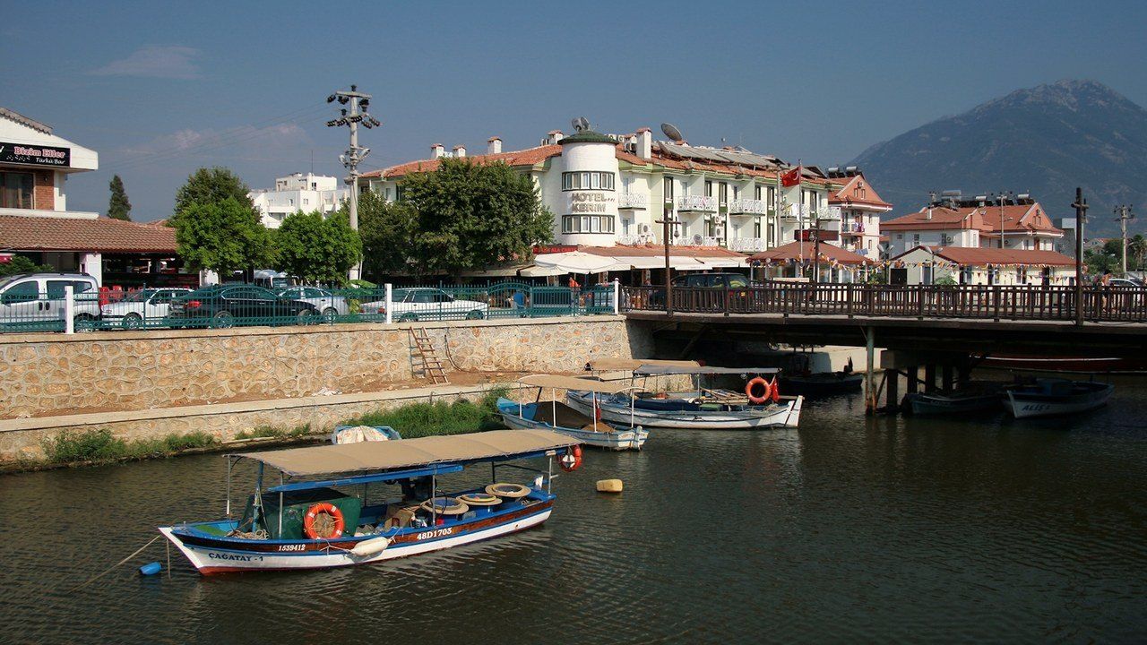 Waterfront promenade and traditional boats at Calis Beach in Fethiye