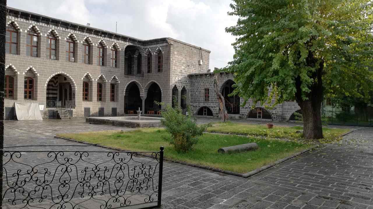 Wide view of Cemil Pasha Mansion courtyard, home to Diyarbakir City Museum in Sur, Turkey.