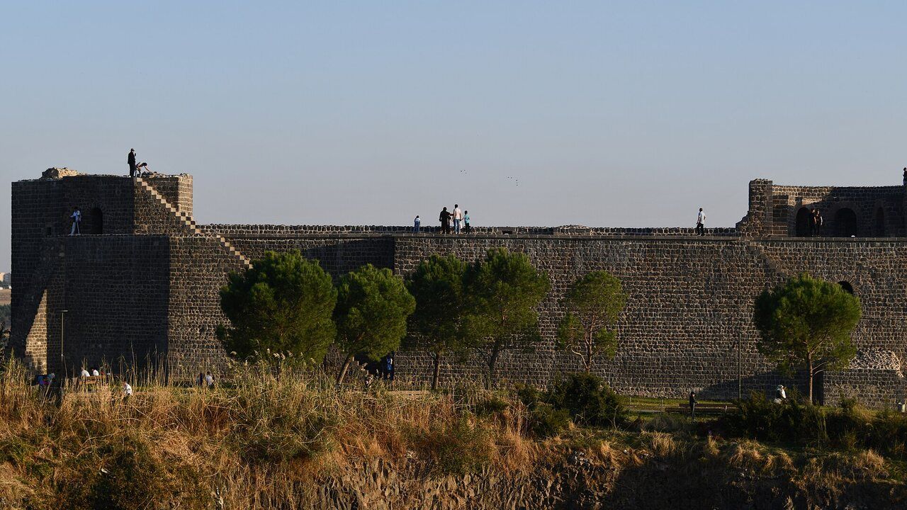 Visitors on the southern ramparts of İçkale citadel in Diyarbakır, Turkey.