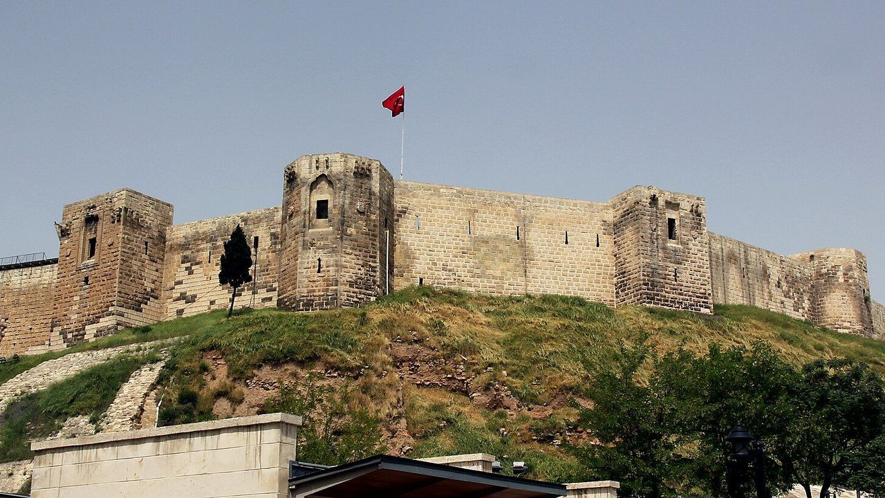 Gaziantep Castle rising above the city under a clear blue sky