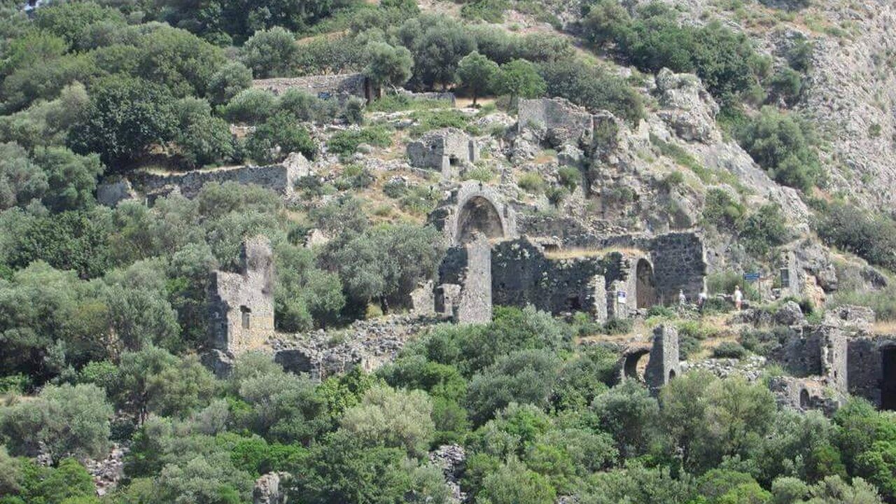 Historic Byzantine ruins surrounded by Mediterranean vegetation on Gemile Island