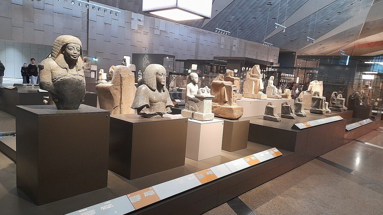 Ancient Egyptian artifacts displayed inside the Grand Egyptian Museum in Giza, Egypt