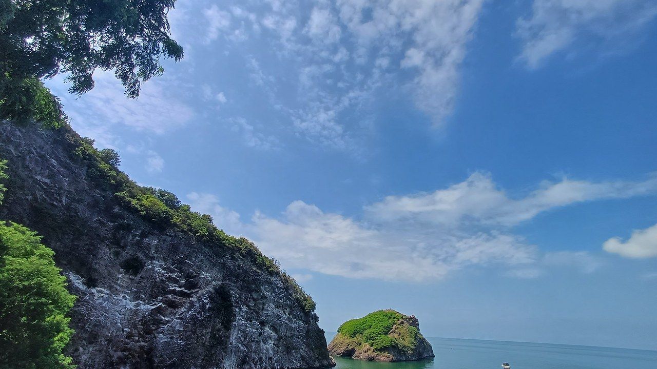 Hoynat Island framed by rocky cliffs on the Black Sea coast