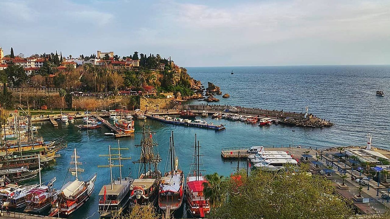 Wide view of Kaleici Old Town harbor in Antalya with boats and the Mediterranean Sea