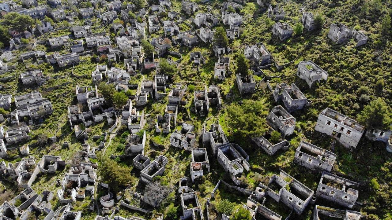 Wide view of abandoned stone houses in the historic village of Kayakoy