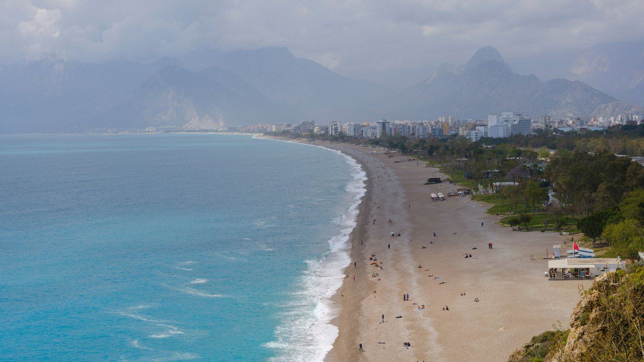 Wide view of Konyaalti Beach in Antalya with the Mediterranean Sea and Taurus Mountains