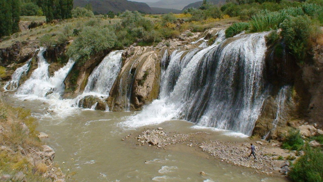 Muradiye Waterfall cascading through a rocky landscape in Van