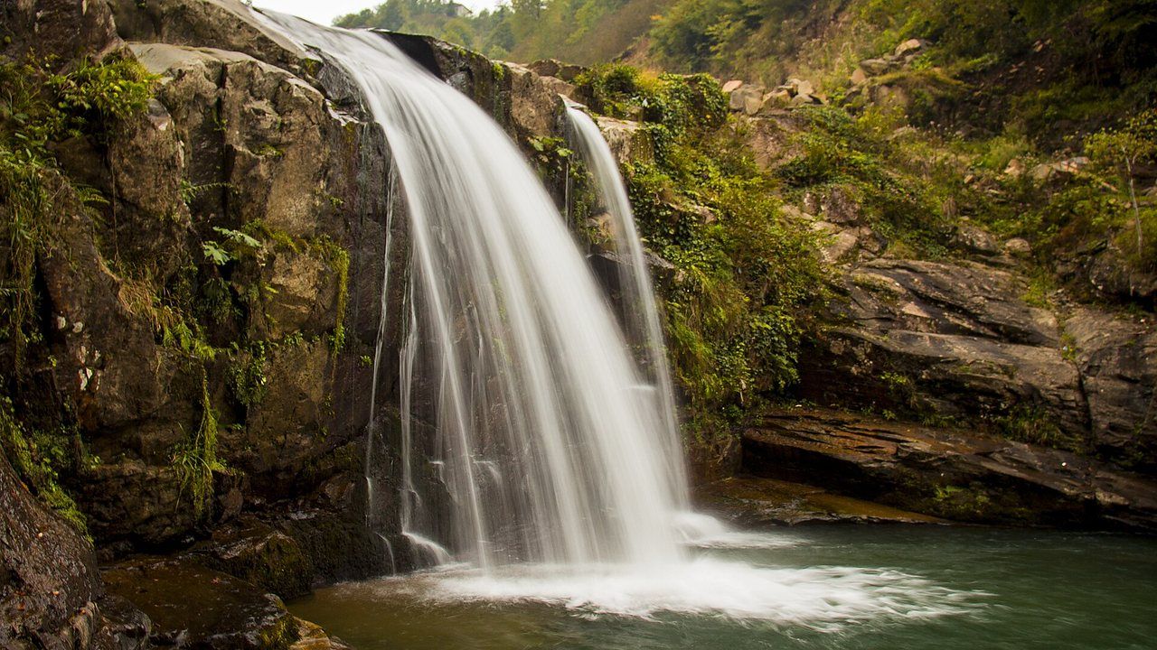 Karaoluk waterfall surrounded by green forest in Ordu