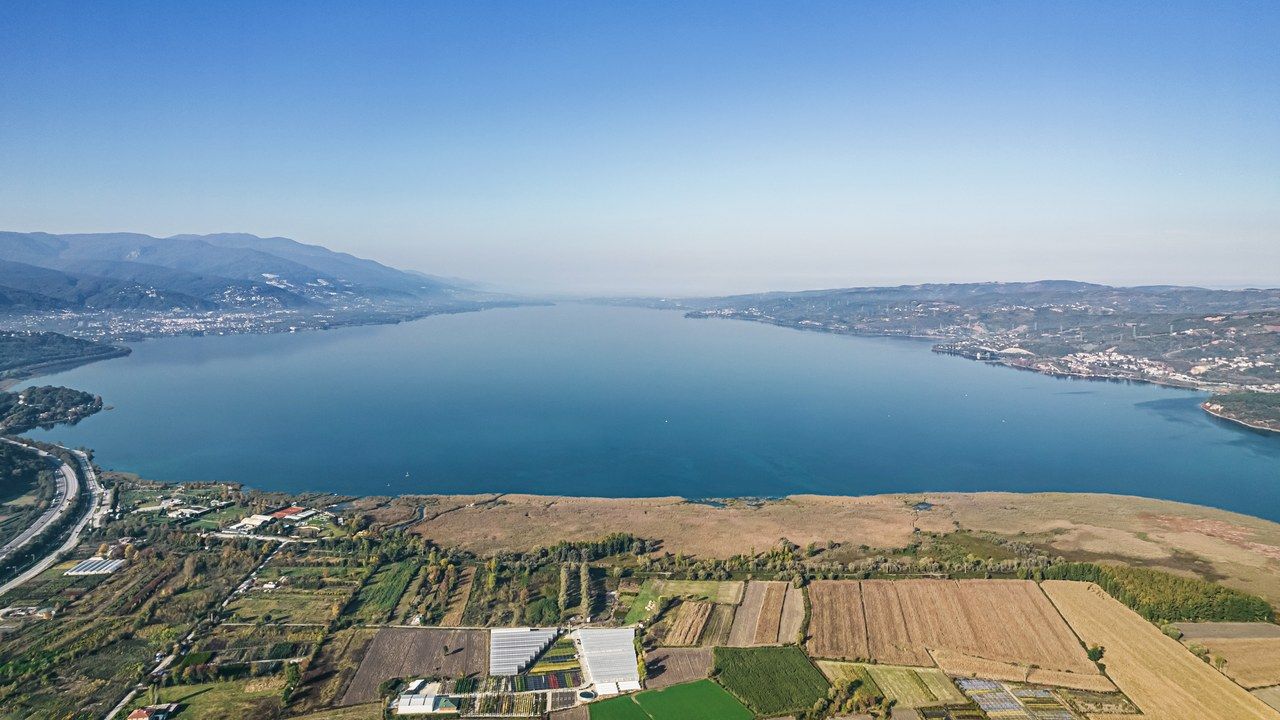 Aerial panoramic view of Lake Sapanca and its surrounding coastline in Turkey